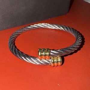 Elegant Gold and Silver Twist Bracelet